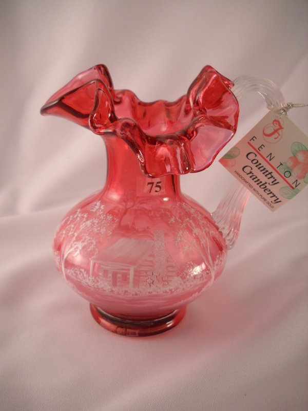 Special order: Cranberry 7" tall pitcher with appli: Special order: Cranberry 7" tall pitcher with applied crystal ribbed handle and handpainted log cabin and pine trees. Made ca. 2001 for the West Virginia Park Authority, this piece is inscribed with t