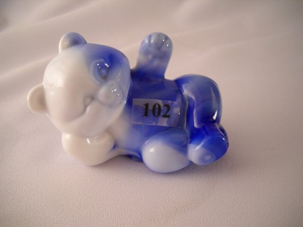 Slag animal figurine: 5233 Reclining Bear figurine: Slag animal figurine: 5233 Reclining Bear figurine, made in June 2000 with Milk Glass and cobalt blue glass.