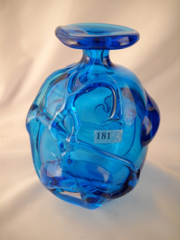 Robert Barber sample: this 8" tall offhand vase in: Robert Barber sample: this 8" tall offhand vase in blue (probably Colonial Blue) features applied hot glass to create a most unusual contemporary effect. The bottom is ground and polished and has the 