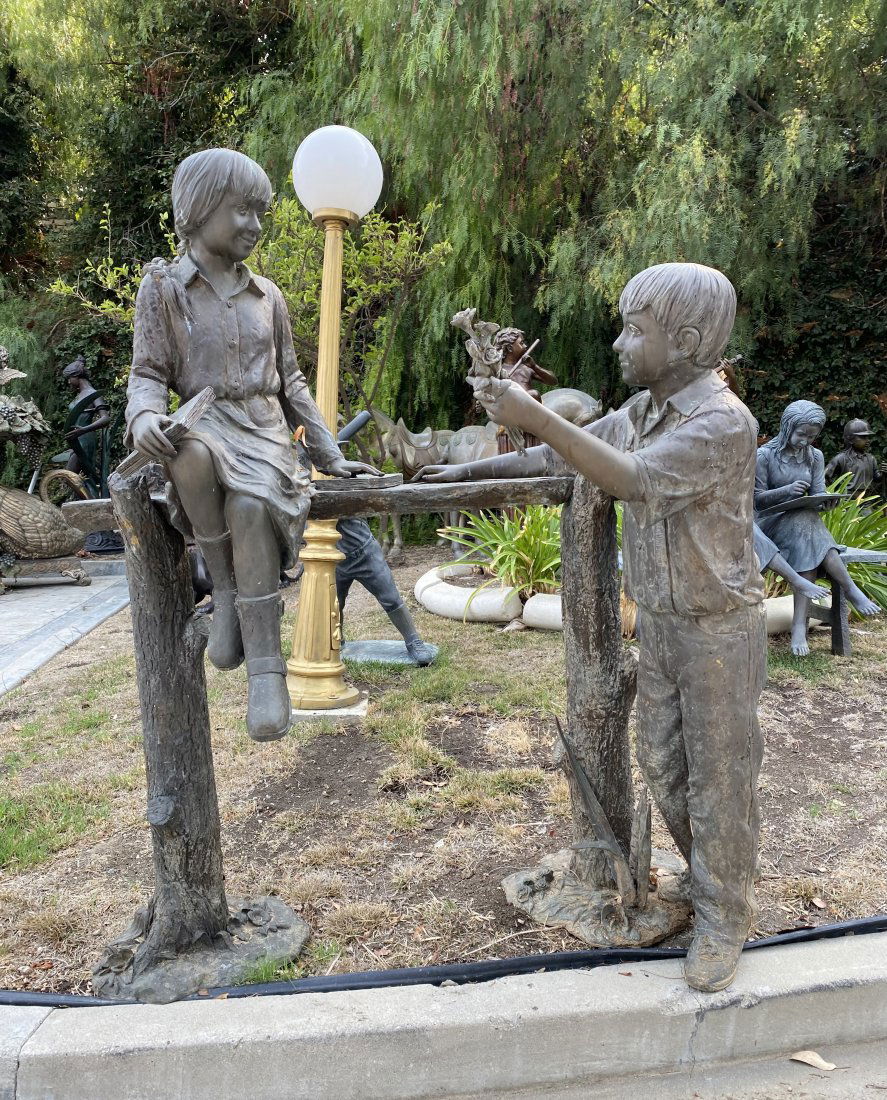 Life Size Boy and Girl Statue: Romantic bronze Sculpture; Boy giving a flower to the girl. Outdoor Garden Decoration. Over 300 pounds