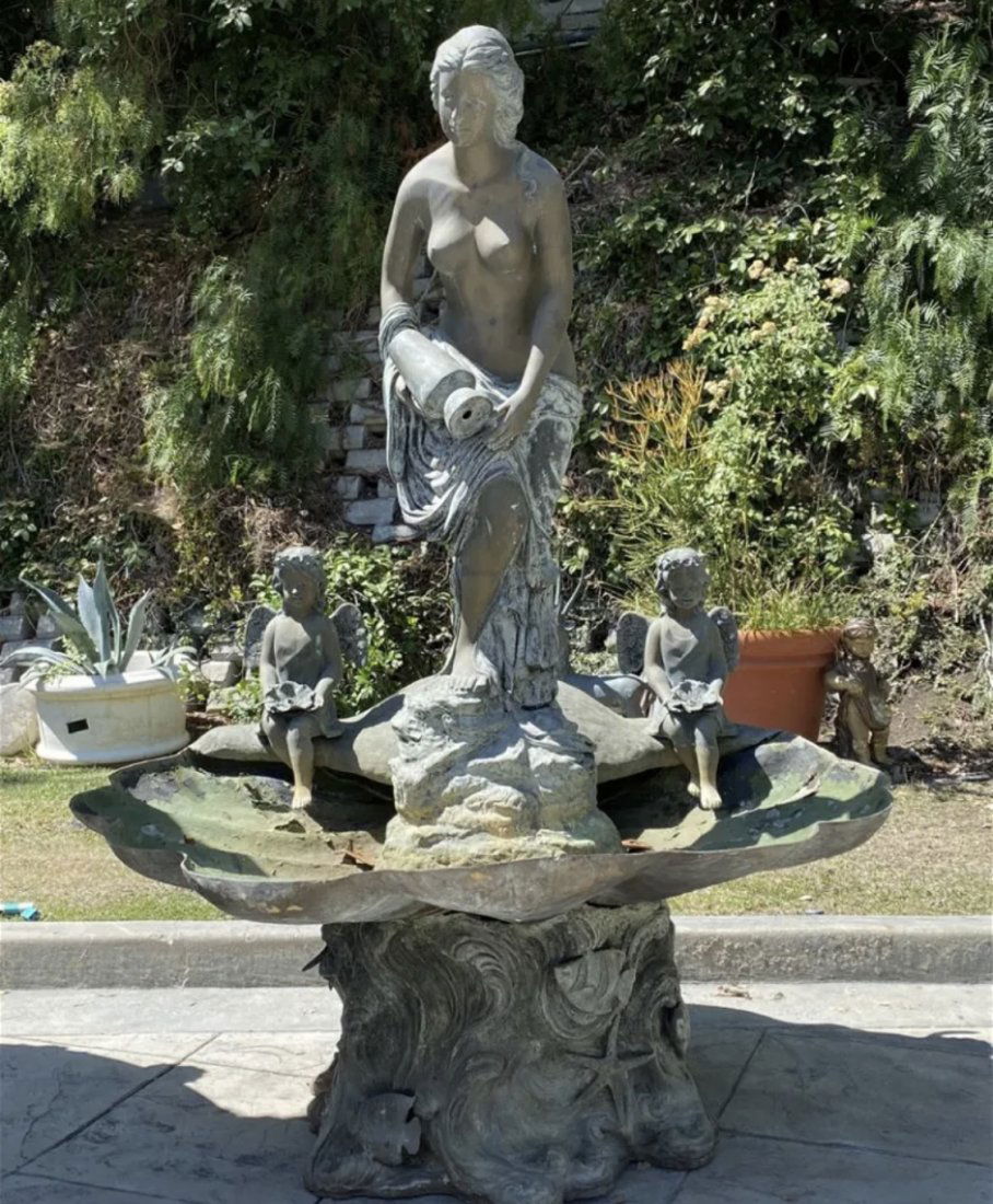 Massive Bronze Woman and Fairytales Fountain (1 of 5)