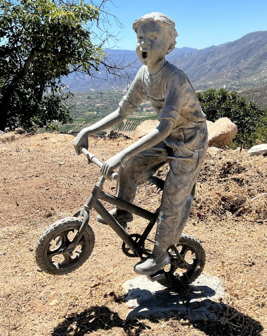 Boy Riding a Bike Bronze Sculpture (1 of 3)