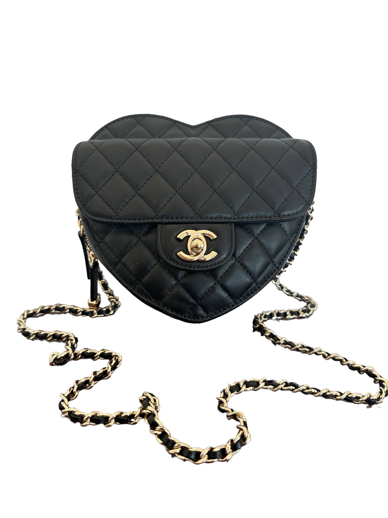 Chanel CC in Love Heart Bag Quilted: Very good condition. Made in Italy - 6.5"W x 6.5"H x 2.5"D20" handle drop20" strap drop. Includes box and dust bag.