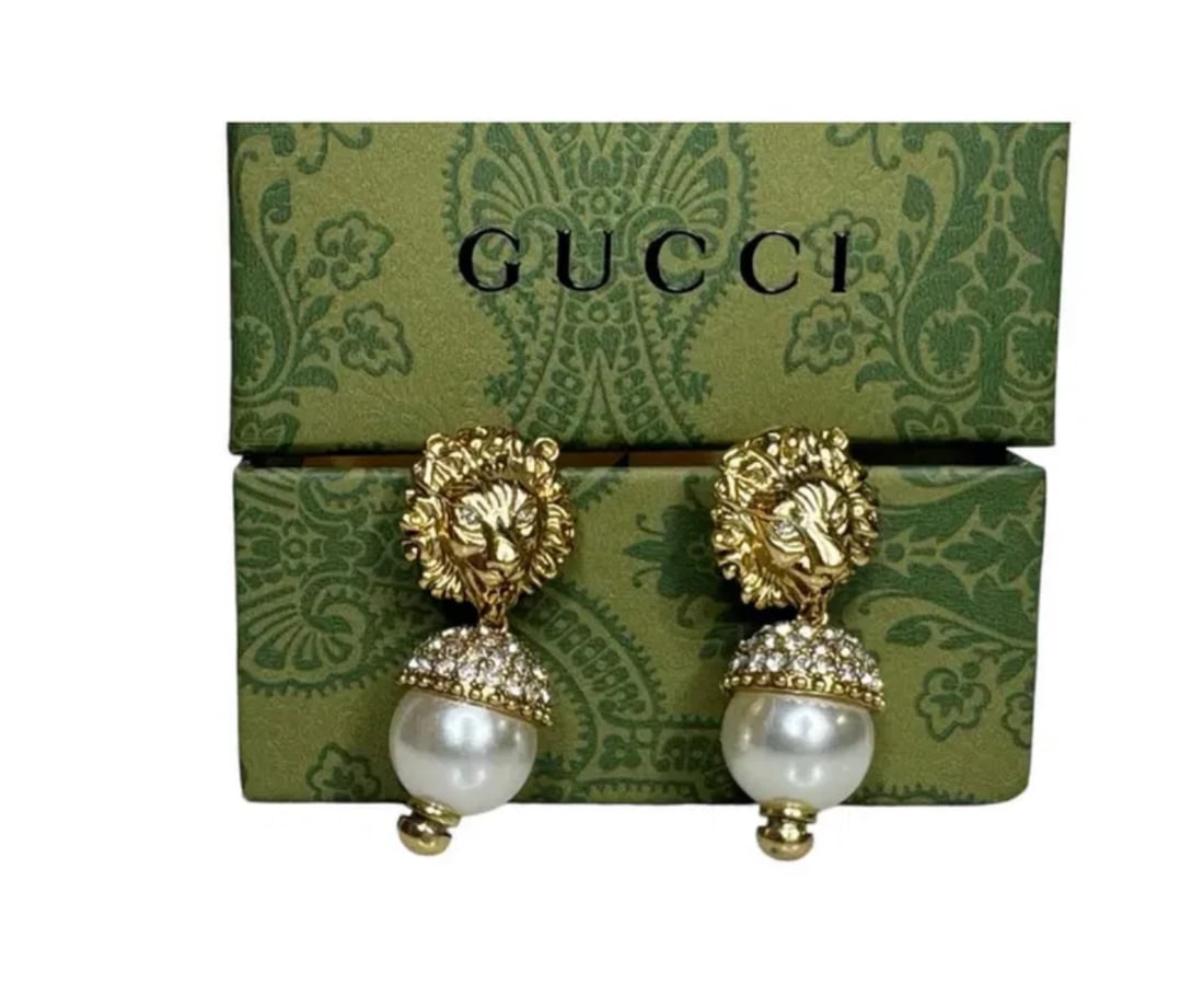 Gucci Pearl Earrings: Includes box and dust bag. Missing one zirconia - Shipping available only.