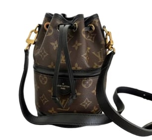 LOUIS VUITTON Canoé Monogram Canvas Handbag