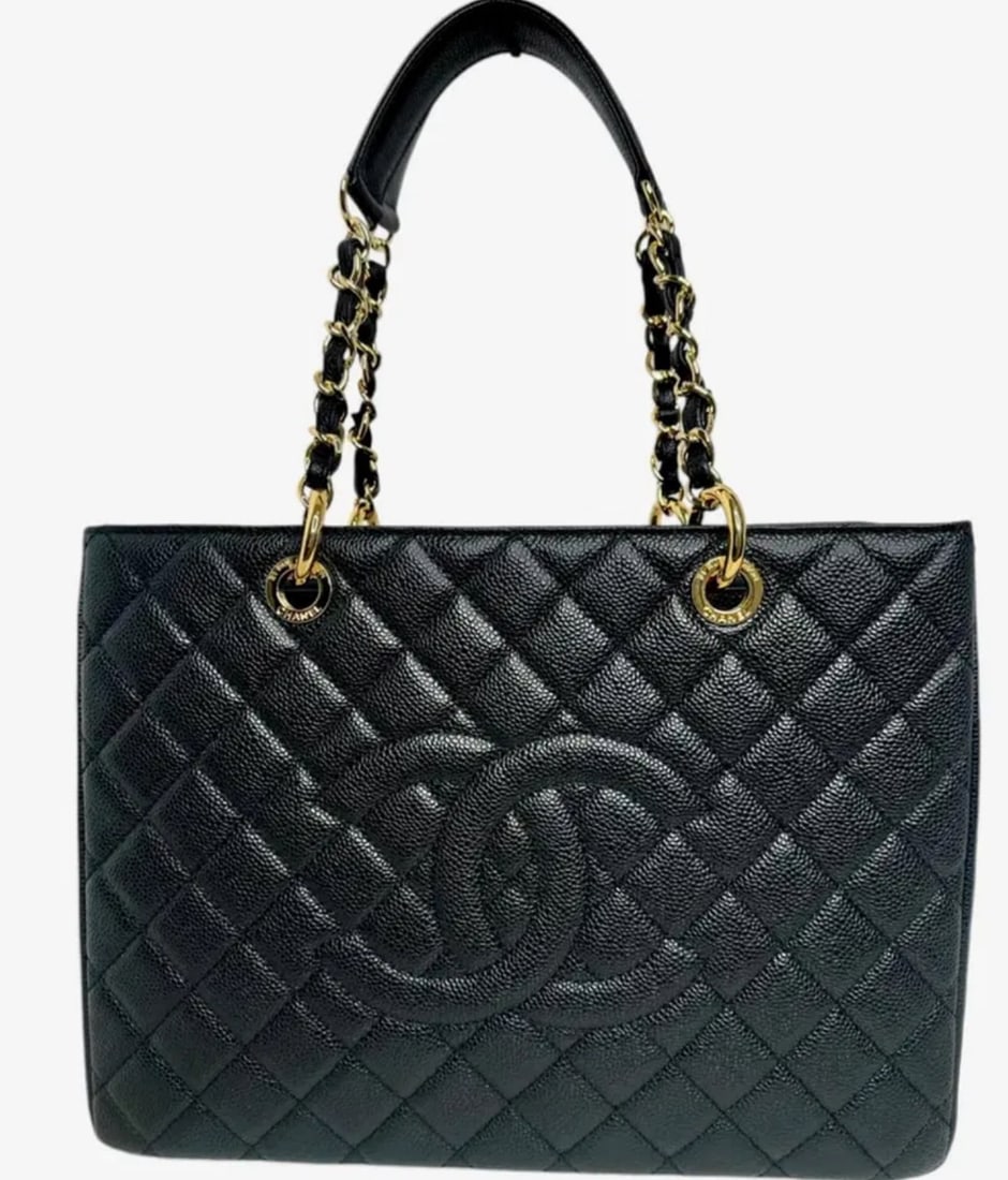 CHANEL Caviar Quilted Grand Shopping Tote: Length: 13" (33 cm)Height: 9.5" (24 cm)Depth: 5.25" (13 cm)Strap Drop: 9" (22 cm)-Made in Italy - Includes Dust Bag. - Shipping Only.