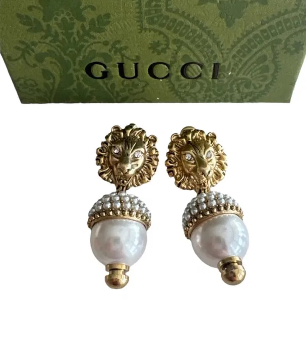 Gucci Lion Earrings: Gucci Stamped on the back. Includes Box- Shipping only.