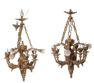 A pair of French cast-bronze Empire chandeliers