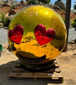 Giant Emoji Face with Heart Sculpture