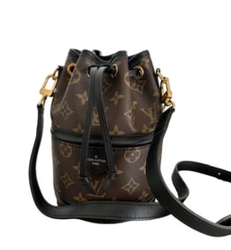 LOUIS VUITTON Canoé Monogram Canvas Handbag