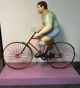 Life Size Boy on Bike by Sergio Bustamente Sculpture