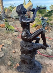 Life -size Bronze girl playing the flute