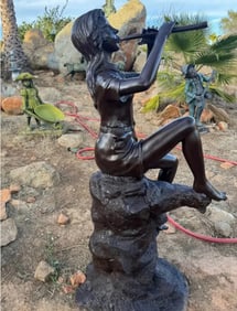 Life -size Bronze girl playing the flute