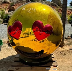Giant Emoji Face with Heart Sculpture