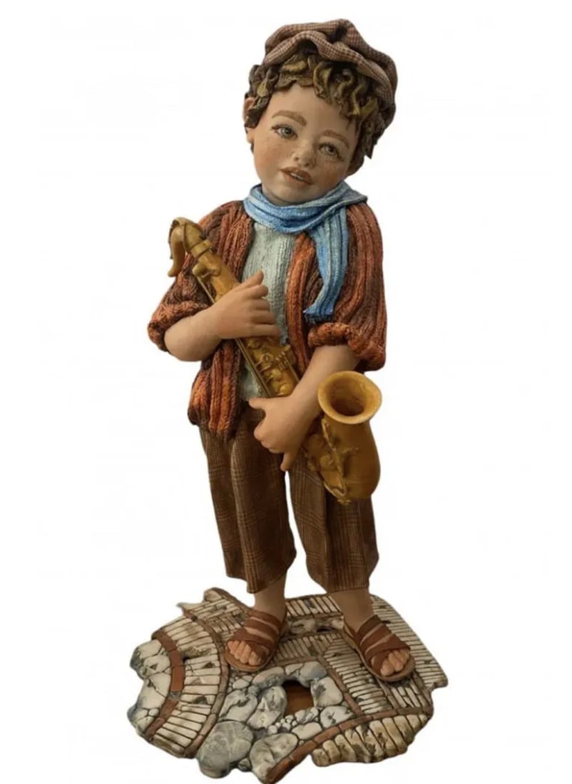 Large Italian Capodimonte Porcelain Boy with saxophone: Measurements: 19 in H x 11 in L
