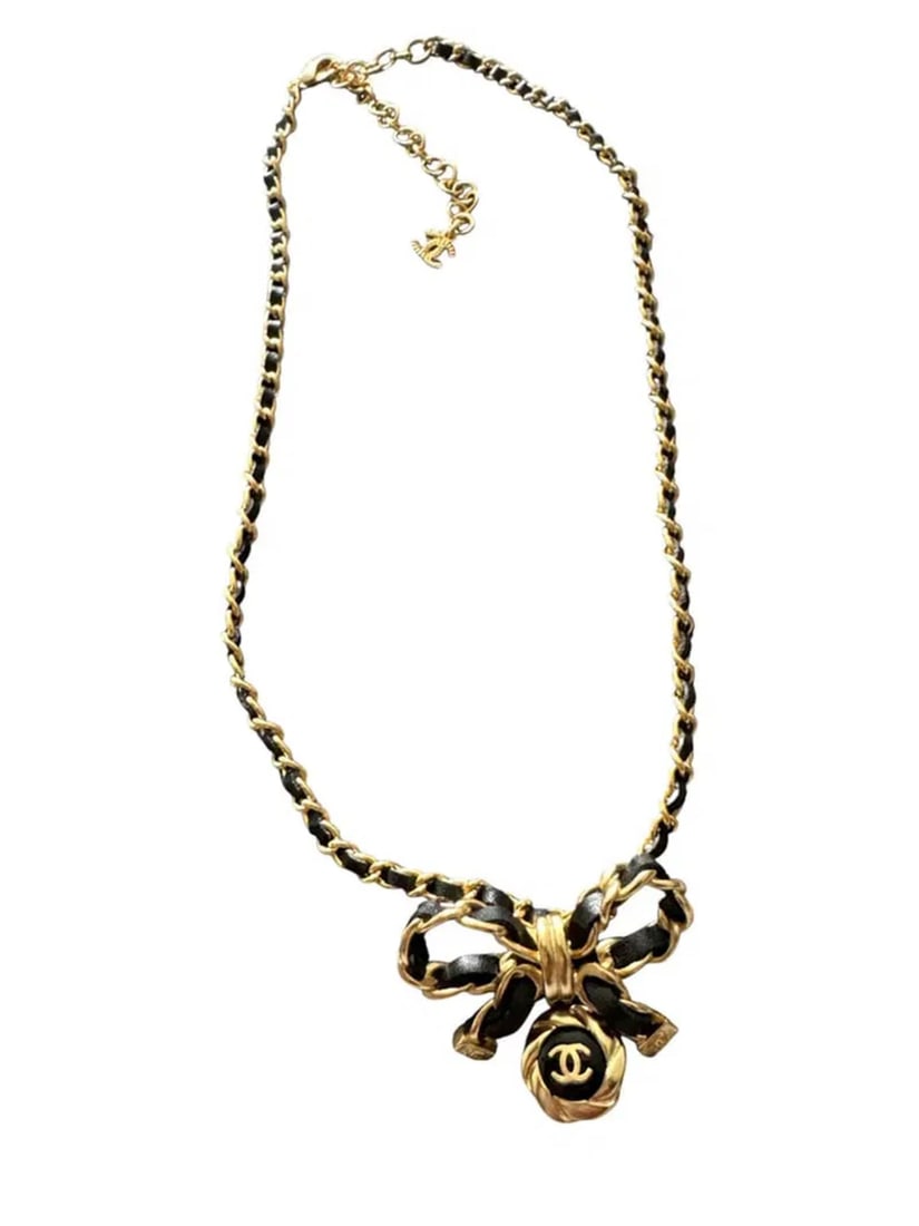 Chanel Gold and black Necklace: iNCLUDES BOX- Shippin only -All sales are final,please inspect all the items before bidding.