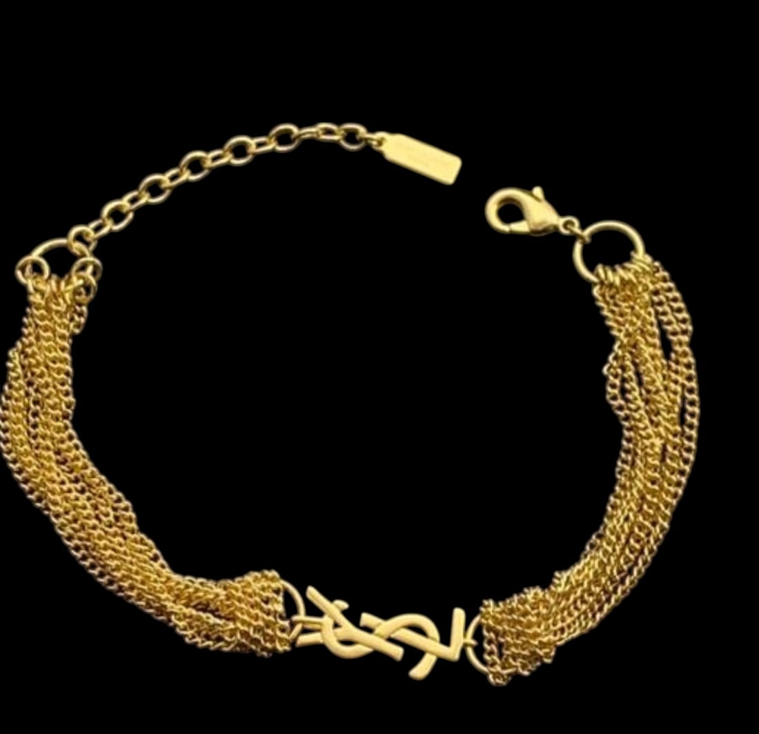 YSL GOLD BRACELET: iNCLUDES BOX- Shipping only -All sales are final,please inspect all the items before bidding