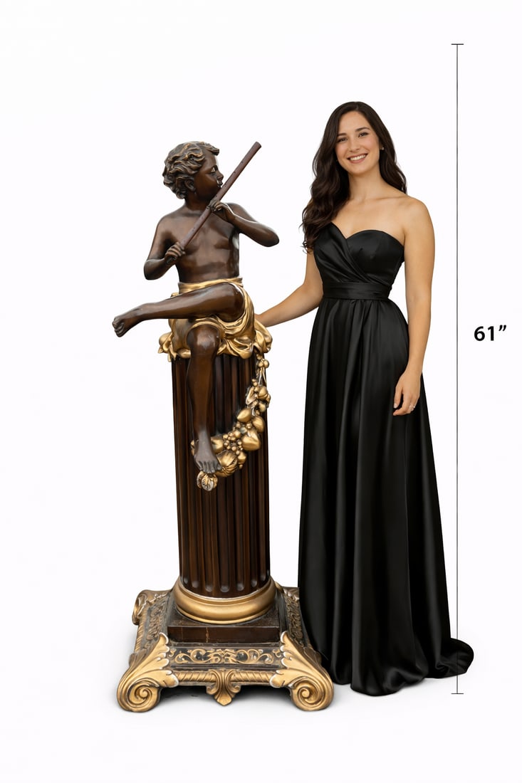 Life size Bronze Cherub Neoclassical Figure on Pedestal: This elegant sculptural piece depicts a classical cherub figure seated atop a fluted column, captured in a moment of quiet musical expression as the figure plays a flute. The cherub’s relaxed