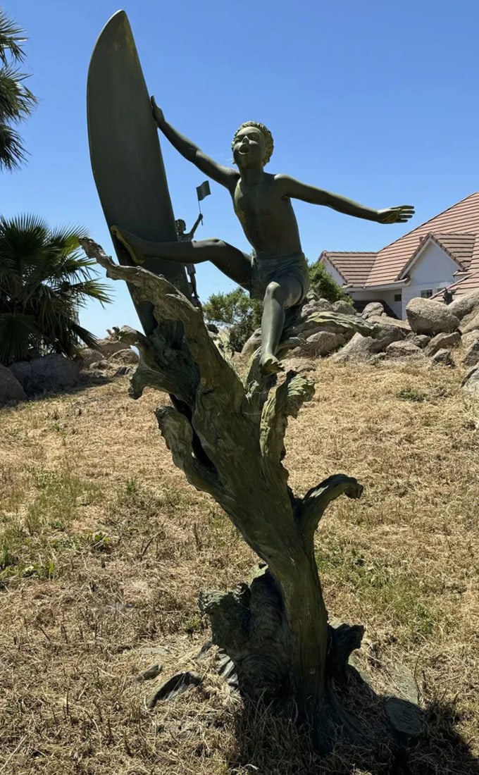 Life Size Bronze Boy Surfing by Jim Davidson: Size:105 in x 50 in x 50 in