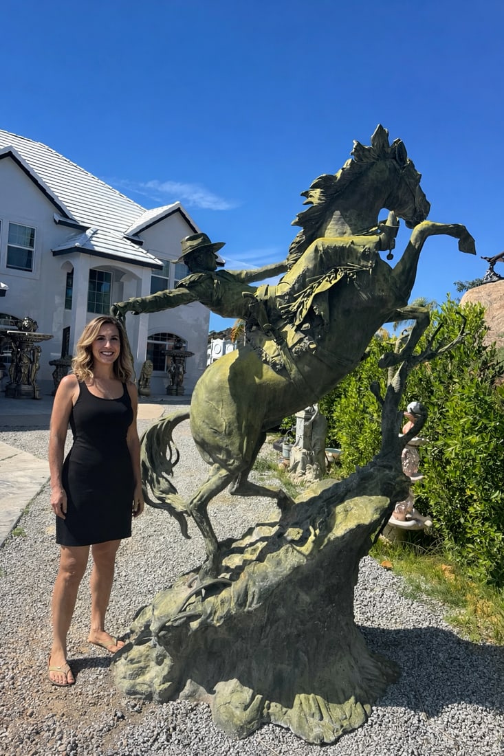 Monumental Bronze Cowboys Sherrif Sculpture By Jim Davidson: Size: 115 in H x 80” Length x 55 in W - A rugged Western rider, wearing a wide-brimmed cowboy hat and traditional frontier attire, leans backward as his spirited horse rears high on its hind leg