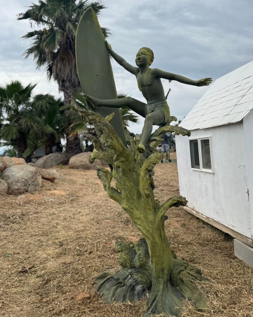 Life Size Bronze Boy Surfing Sculpture by Jim Davidson: Size: 104” H x 50 in