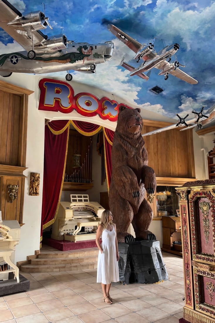 Monumental 16 Ft Hand-Carved Wooden Bear – One Solid Log: Size: 16ft x 60” x 60” - Monumental hand-carved wooden bear sculpture, masterfully crafted from a single solid piece of wood. This impressive statement piece was formerly owned by Uncle Ph