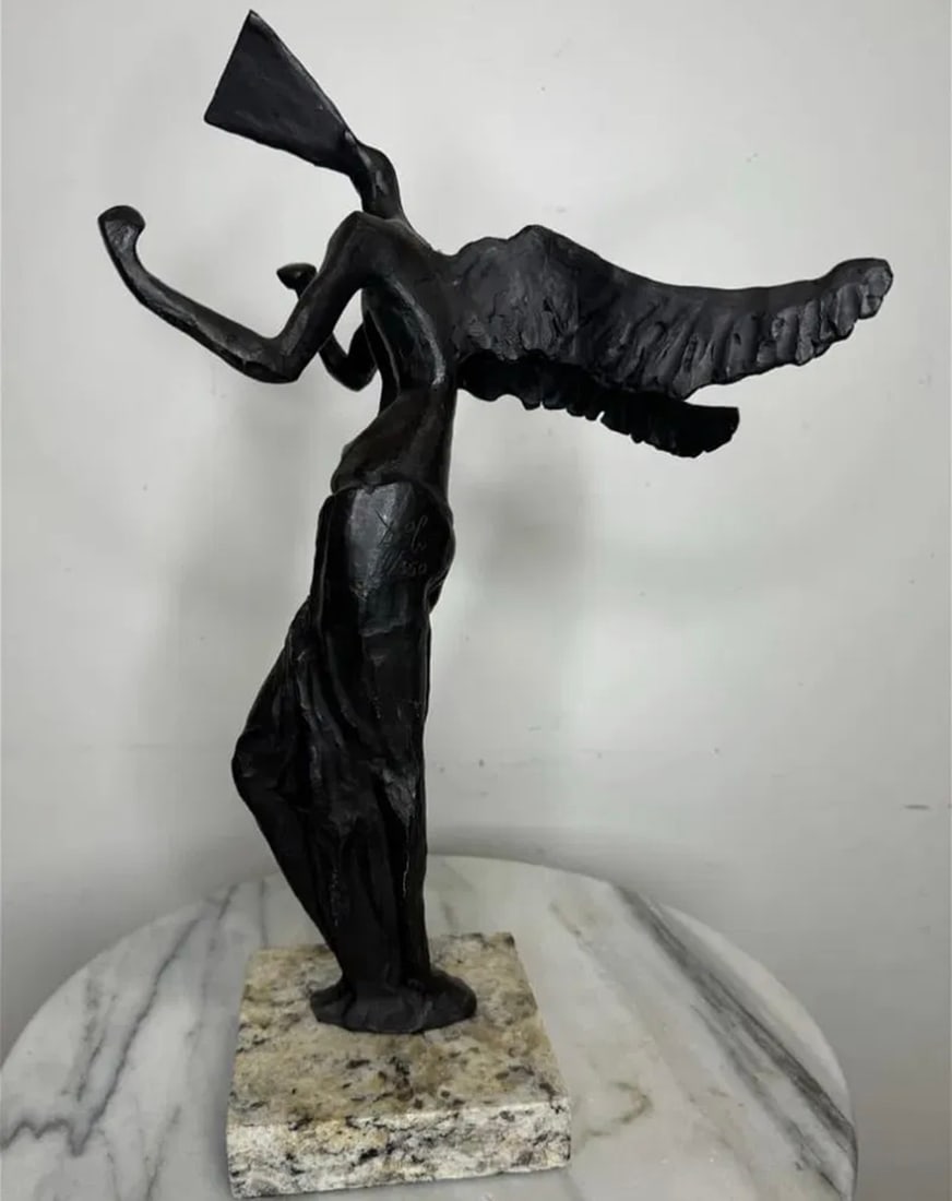 Dali Abstract Bronze Sculpture: Size: 17 in x 11 in