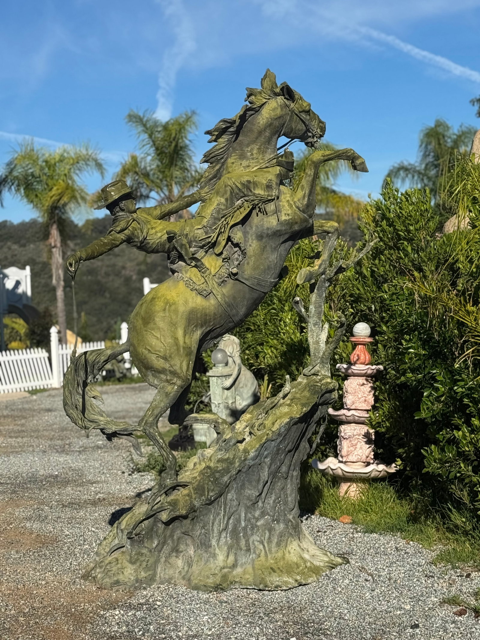 Monumental Bronze Cowboy Bronze Statatue by Jim Davidson: size: 115 in x 80 in Lx 50 in W