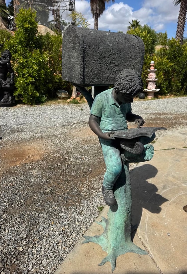 Life Size bronze boy and mailboz sculpture: size: 50 in H