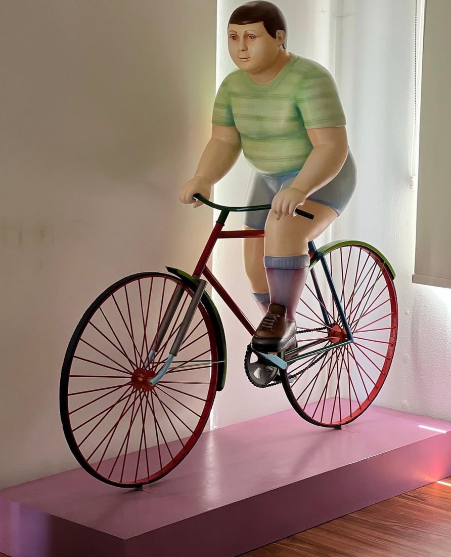 Life Size Boy Riding Bike By Sergio Bustamante: size: 67 in x 58 in x 25 in