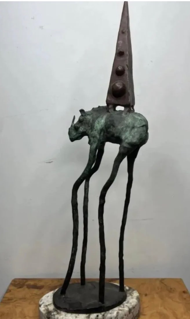 Dali Rhinoceros Bronze Sculpture: Measurements: 21 in x 7 in