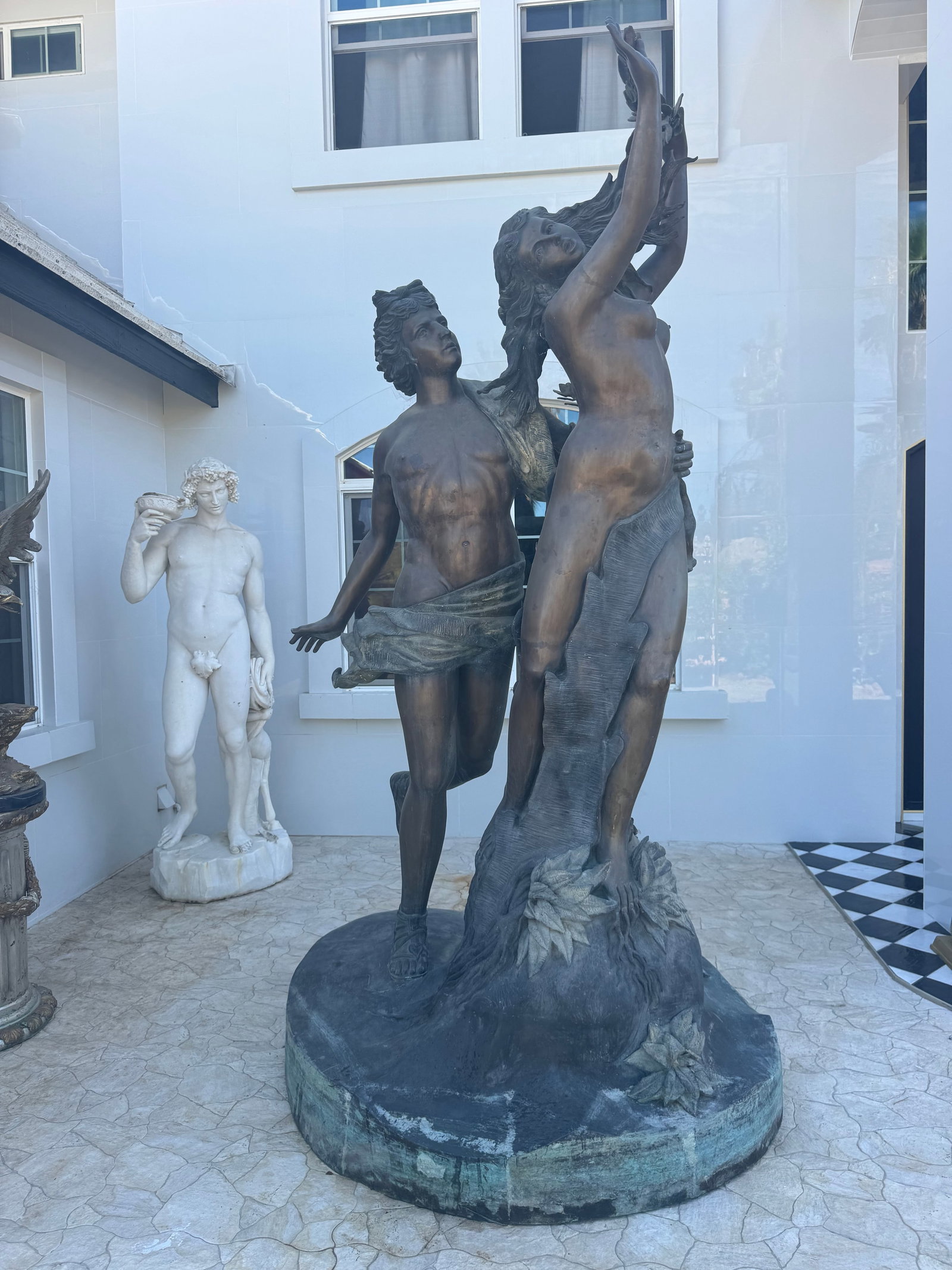Monumental Apollo and Daphne Bronze Sculpture: Size: 120” inches tall x 60 “ diameter