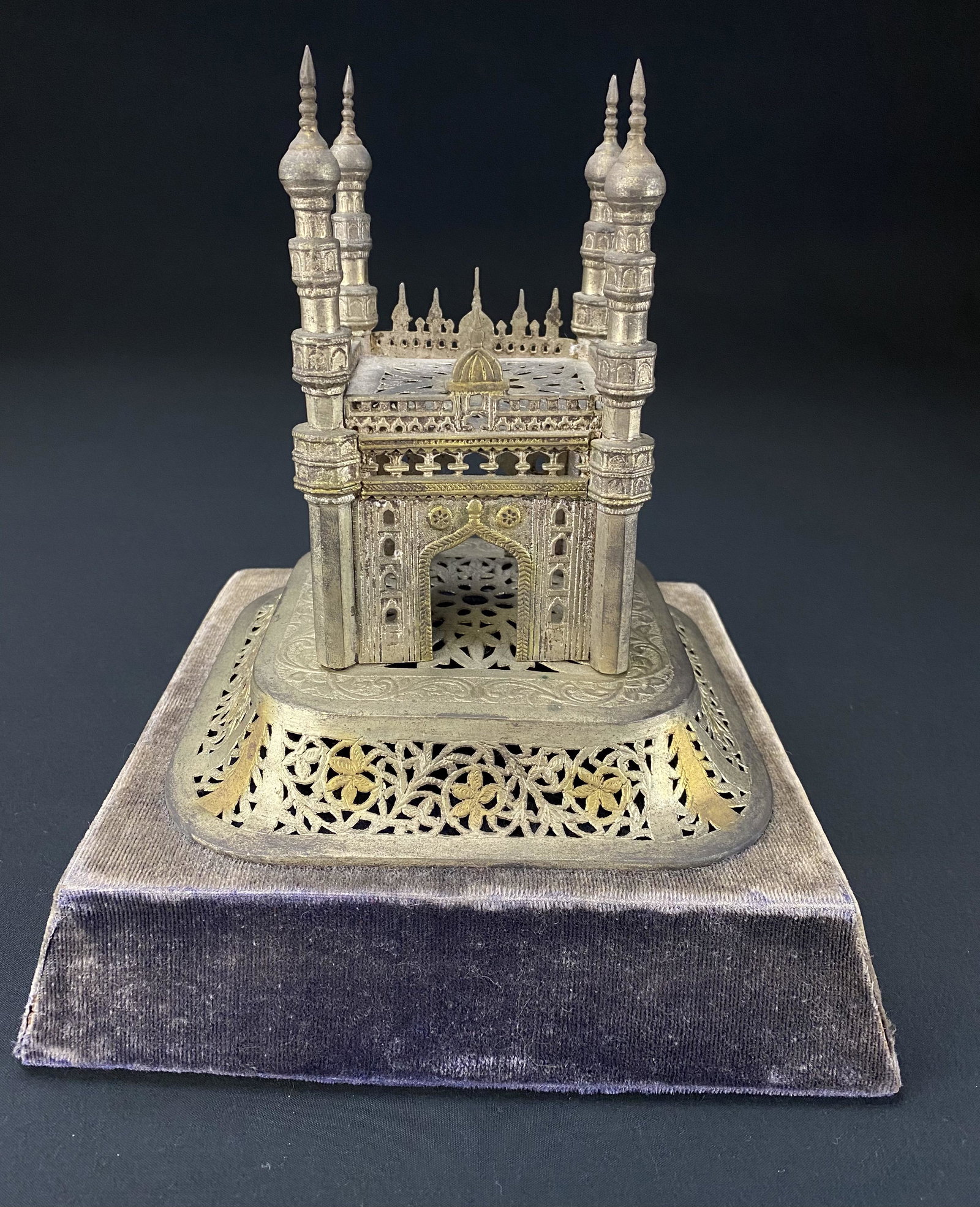 Antique Table Top Replica Turkish Mosque on Velvet base: Antique table top replica Turkish mosque on velvet base. The mosques is hand made and silver leaf and Gold gilt highlights. The Mosque is mounted to a nicely worn velvet base, and appears to have once