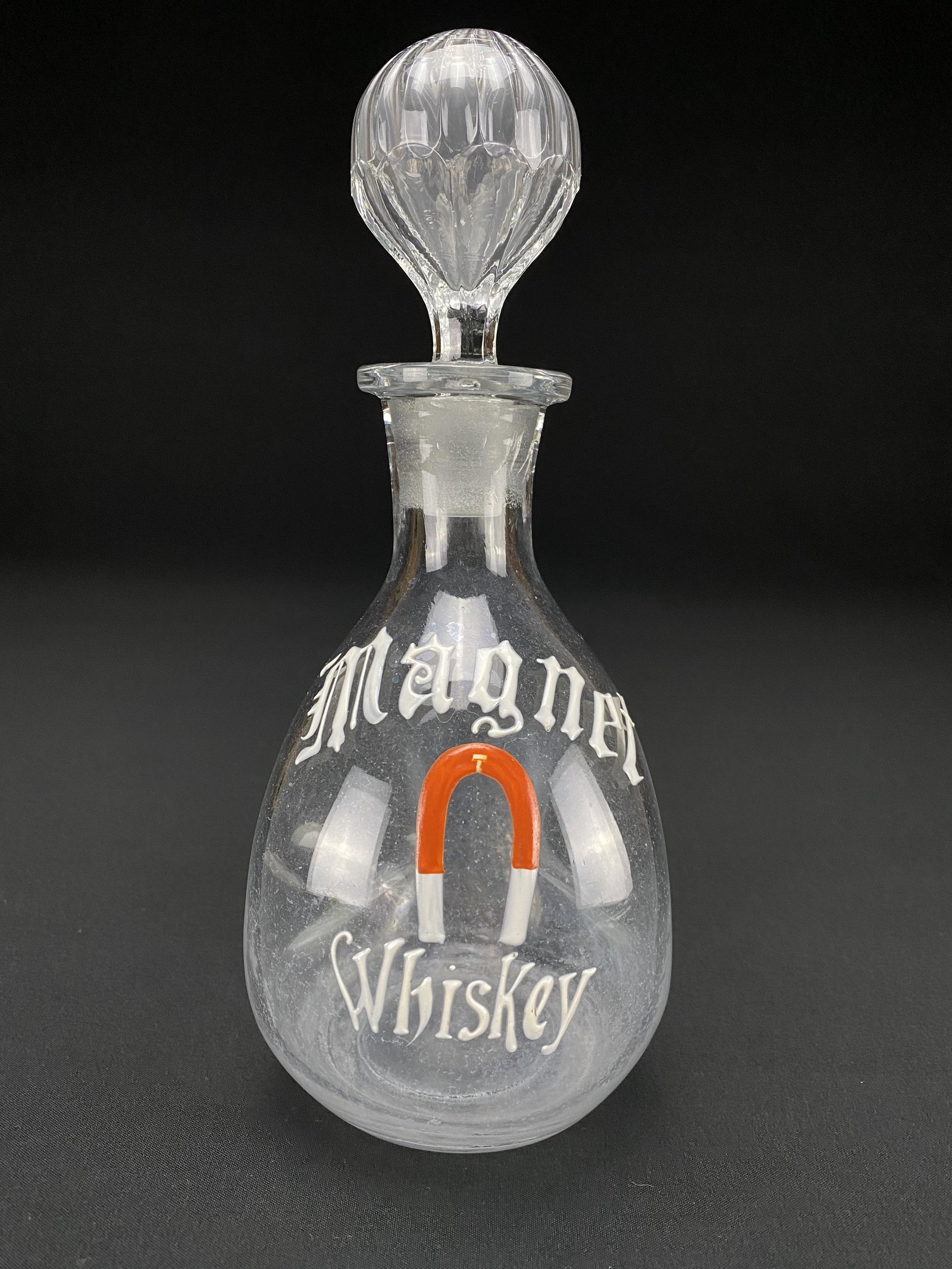 Antique Rare Magnet Whiskey Back Bar Decanter: Antique rare Magnet Whiskey Back Bar Decanter with enameled decoration. Research revealed that this is possibly one of a kind. This is a great example of western saloon ephemera. It is in estate condi