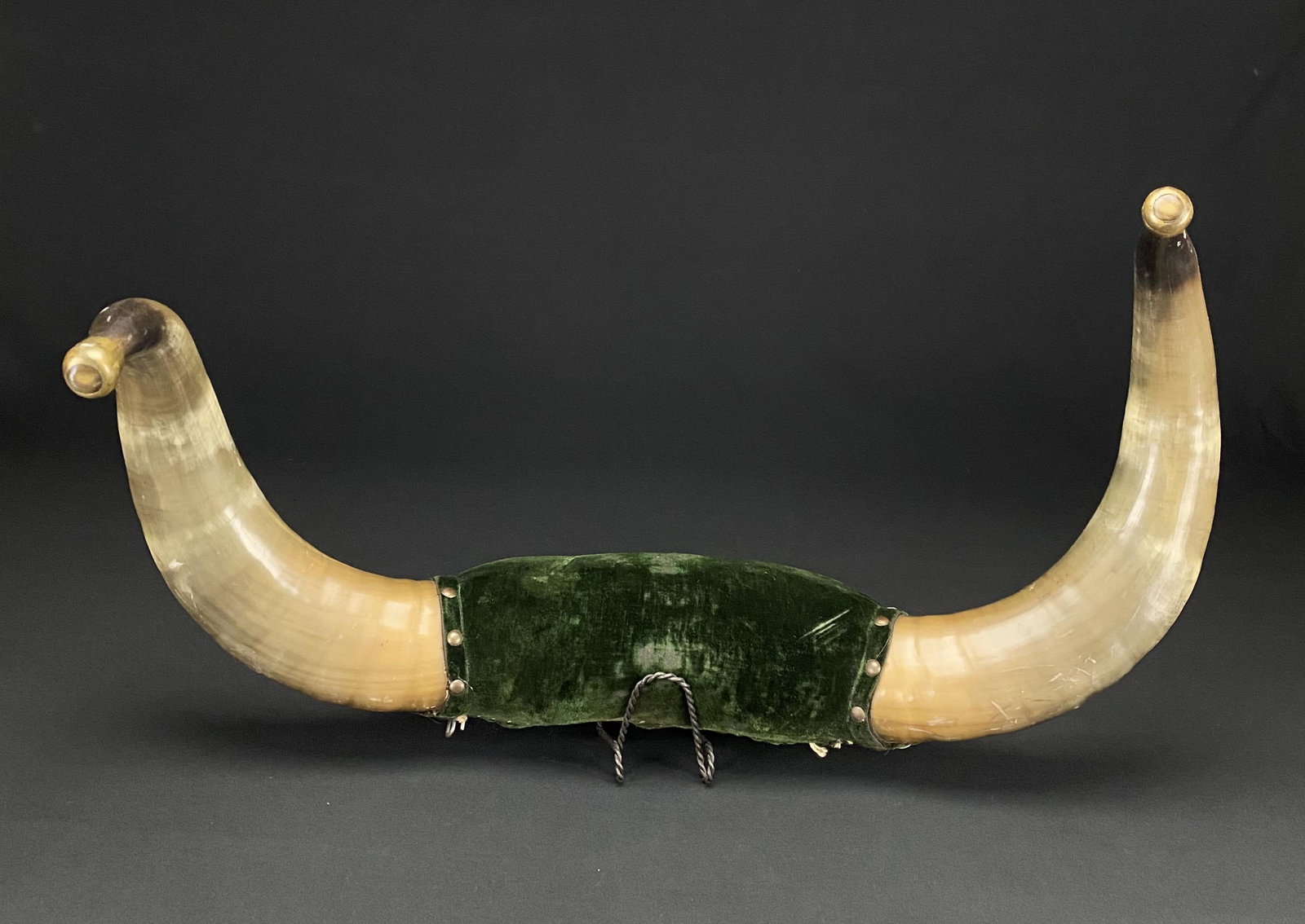 Antique Victorian Bullhorns With Rare Brass Knobs: Antique Victorian bullhorns with rare brass knobs and green velvet. This unusual set of bullhorns includes nicely patinated brass horn knobs. The brass knobs are often referred to as ox knobs, which w