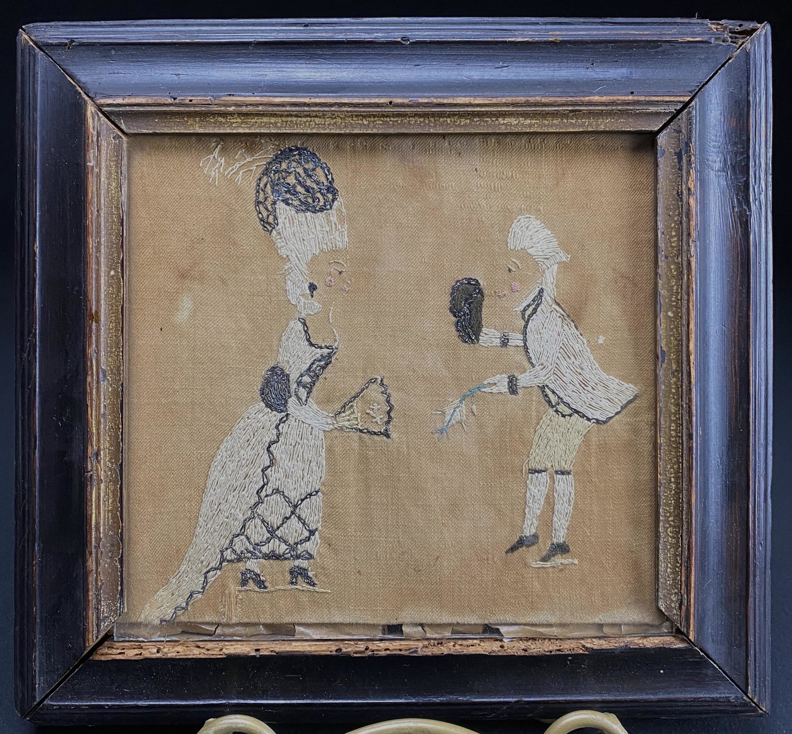 18th Century needlepoint textile stumpwork textile: 18th Century needlepoint stumpwork textile of courting couple. In age-appropriate condition. Issues include surface grime. oxidation, staining and losses. Frame also has losses. Sight size 6.25" X 6".