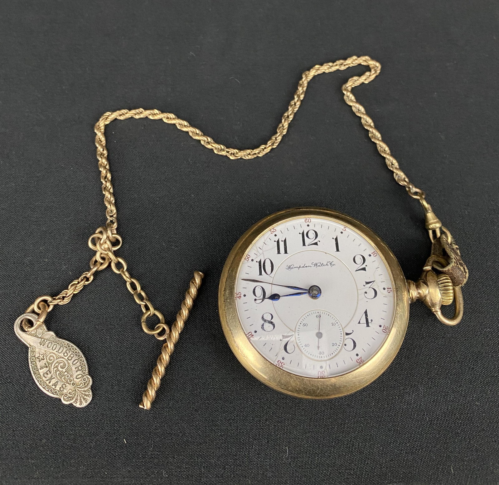 Antique Hampden Watch Co Railway Special pocket watch: Antique Hampden Watch Co Railway Special pocket watch with Woodsboro Texas silver watch fob. Watch has diameter of 2.25". In estate condition currently not functioning, but does wind.