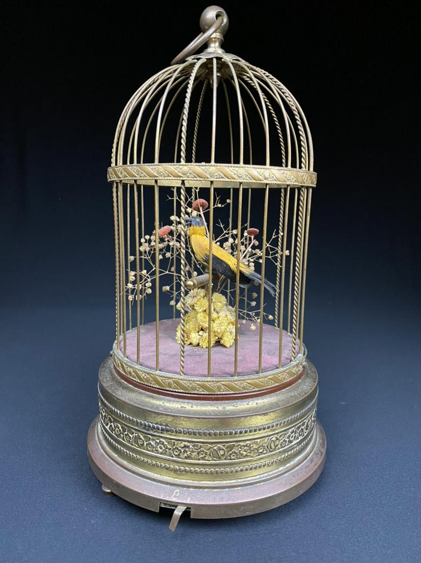 Antique French Brass & Bird Cage Automaton: Antique French brass Cage with automaton bird. The Mechanism is in working order. The bird moves and as it should. The bird does not chirp.