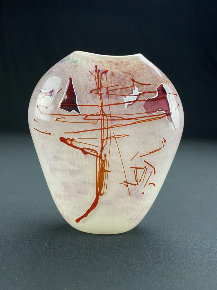 Daniel Gaumer Art Glass Vase Circa 1986: Daniel W. Gaumer American studio art glass vase. It is of a free form design with applied threading. In the style of Stephen Nelson. Signed and dated 1986. Measures 6.25" tall 5.5"wide 1.75"deep. In g