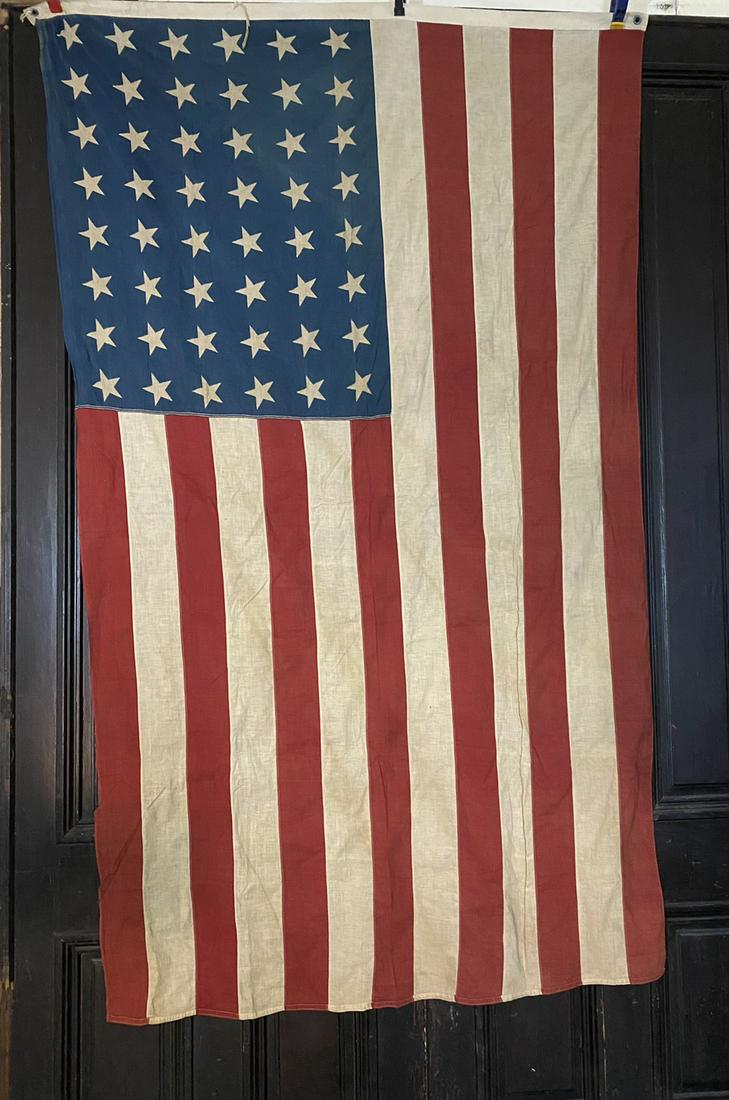 48 star flag: 48 star flag. There is a faint mark on one end of flag