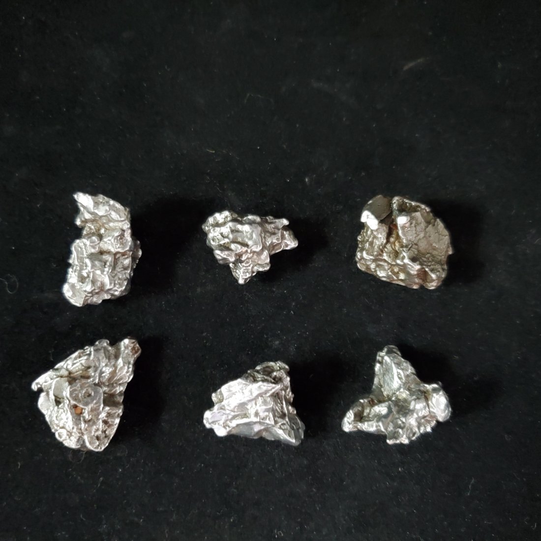 Campo Del Cielo meteorites - lot of 6 - 90 Grams: 90 gram Lot of 6 Campo Del Cielo Meteorites from Argentina weights ranging from 11 grams to 22+ grams each. Campo del Cielo refers to a group of iron meteorites and to the area in Argentina where they