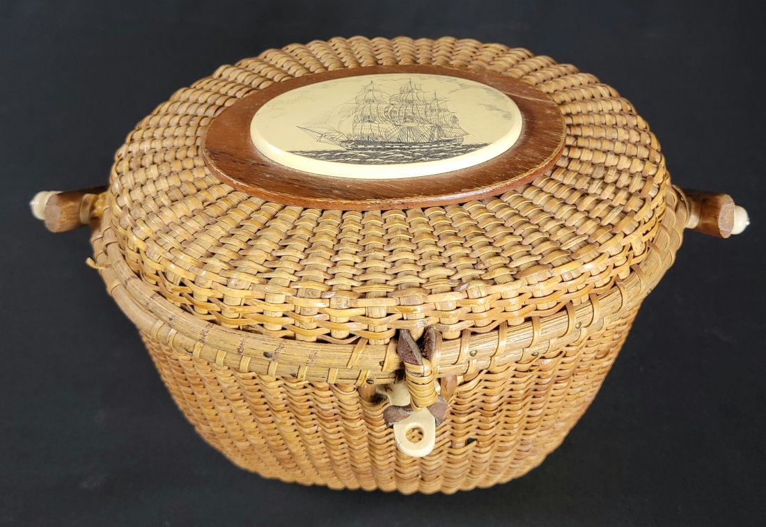 Barlow Nantucket Basket w/ USS Constitution C.1980: Gorgeous Natucket Basket by the Barlow Company in Rhode Island. This Basket company recreates the sought after Nantucket Baskets with a safe polymer scrimshaw on top. The Scrimshaw scene is a ship por