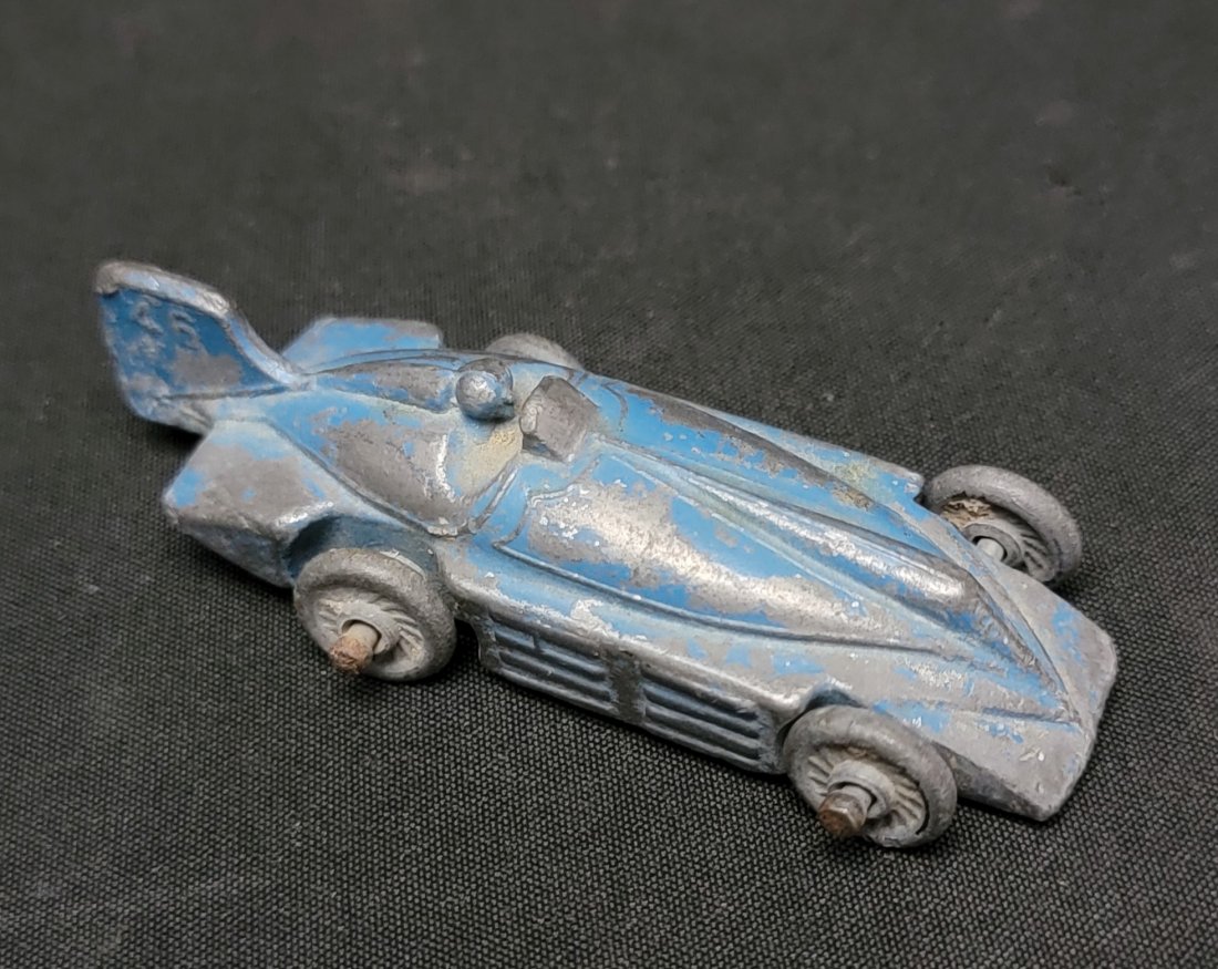 Vintage Kansas Toy Slush Metal Racer: A toy racecar by Kansas Toy and Novelty Company. Kansas Toy was founded in 1923 by Arthur Haynes of Clifton, Kansas, who credited himself the inventor of the slush cast method of toy car production.