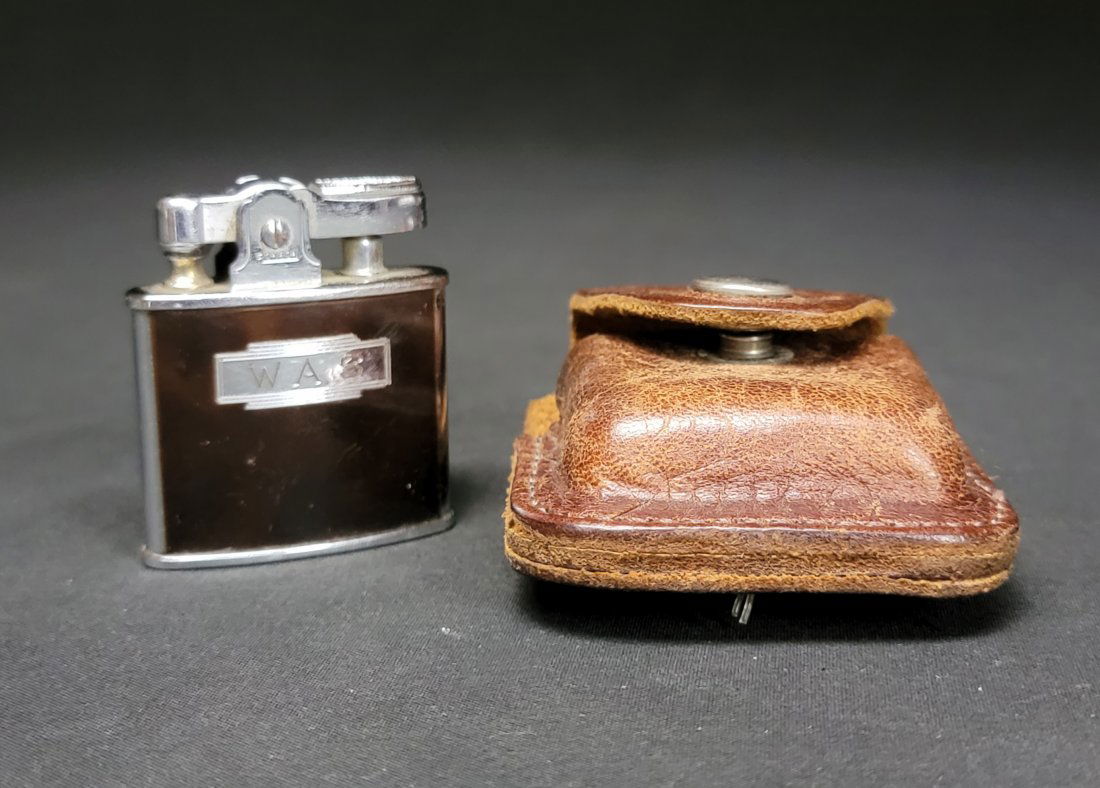 Vintage 1950's Ronson lighter with leather case: Ridiculously hard-to-find mid-century cigarette lighter in its original carrying case.