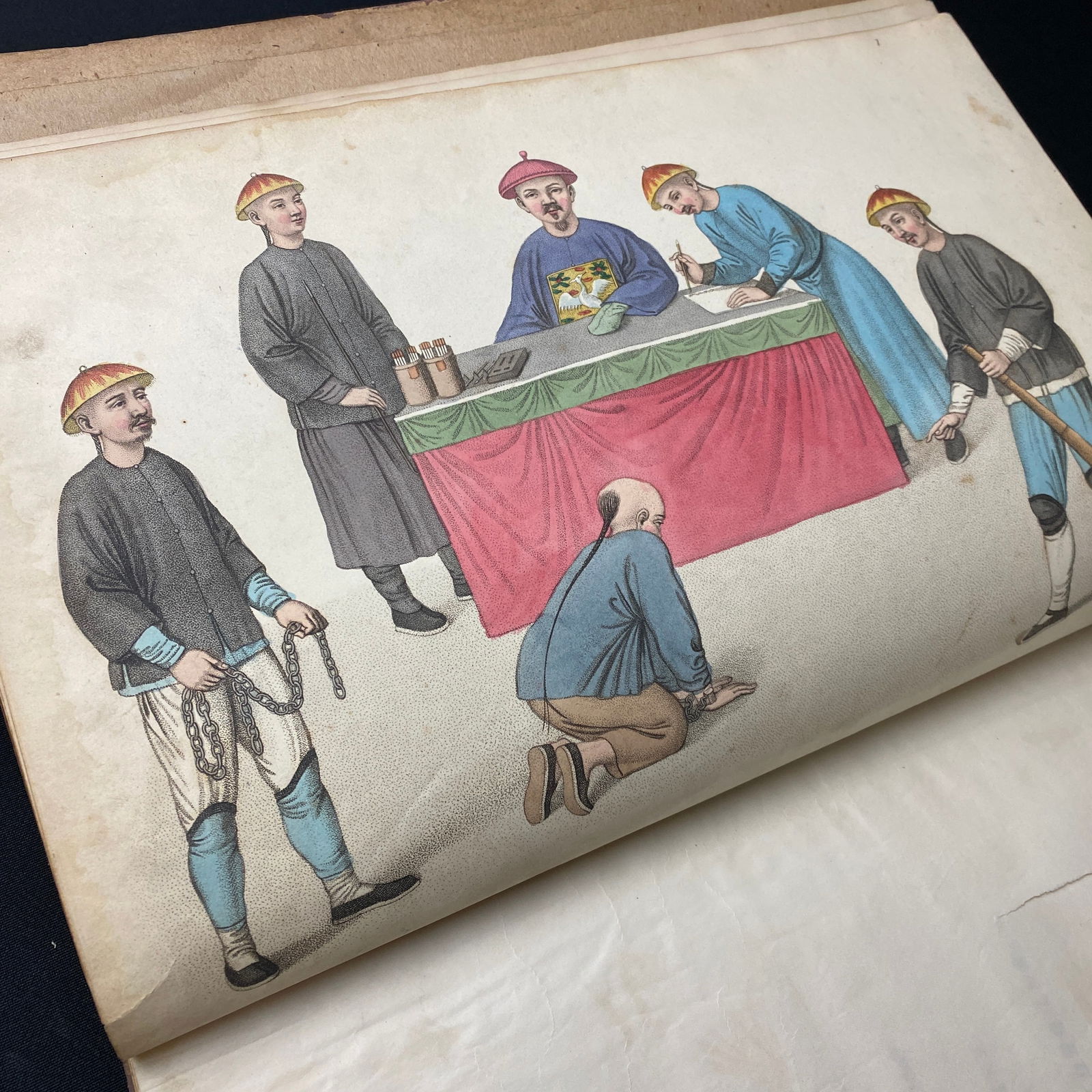 Les Punitions Des Chinois 1804 with hand Colored Engravings: Rare book titled Les Punitions des Chinois Represents En Vingt-Deux Gravures; Avec Des Explications En Anglais Et en Francais. The book was published in 1804 in London by William Miller.