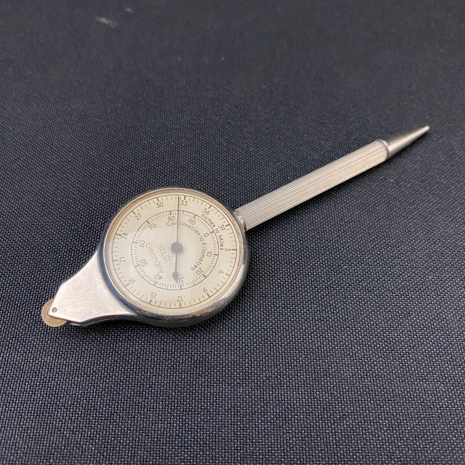Vintage Selsi Co Germany Map Distance Reader Pencil: Vintage Selsi Co Germany Map Distance Reader Pencil. The reader works, and the pencil has lead. The compass still functions