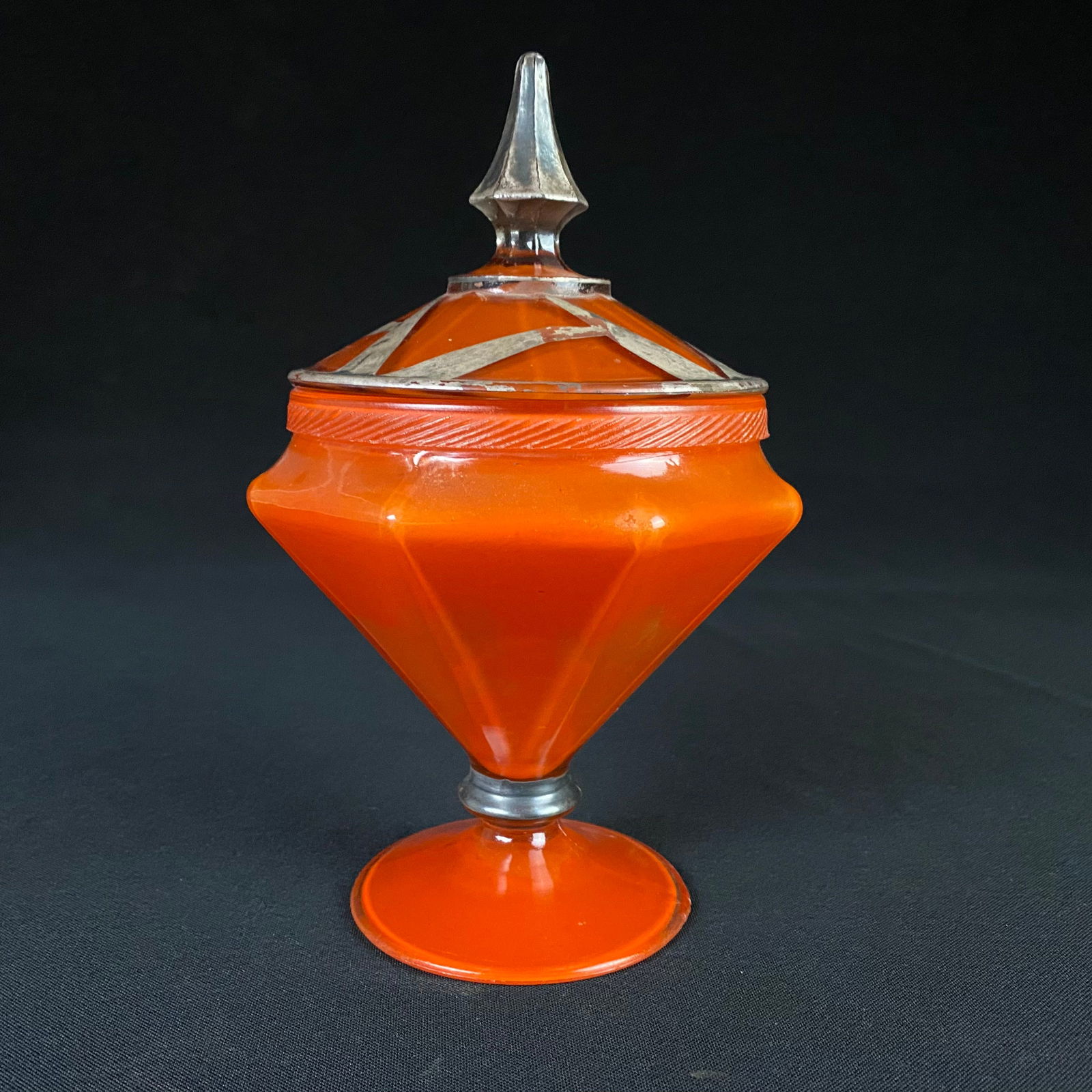 Antique Art Deco Orange Glass Candy Dish with Lid Circa 1930s: Antique Art Deco Orange Glass Candy Dish with Lid Circa 1930s. Overall condition is good, with a large chip on the neck of the lid, and some very minor chipping along the edge of the base(likely due t