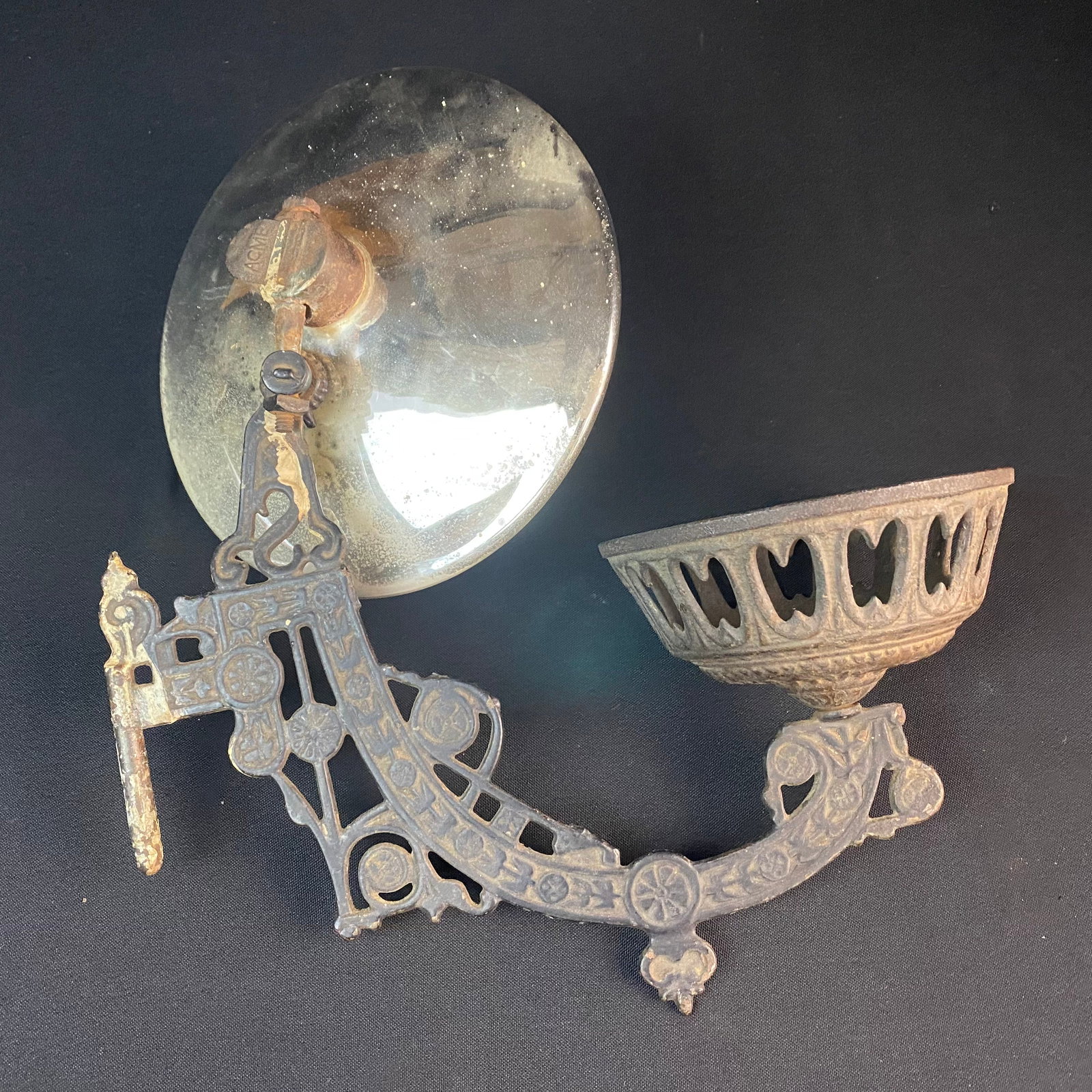 Antique ACME Wall Mount Oil Lamp Holder: Antique ACME Wall Mount Oil Lamp Holder. It measures 15 tall by 8 1/16 wide by 12 deep. The mirror is 8 1/16 in diameter, and the lamp holder is approximately 5 3/8 in diameter at the top by 3 in diam