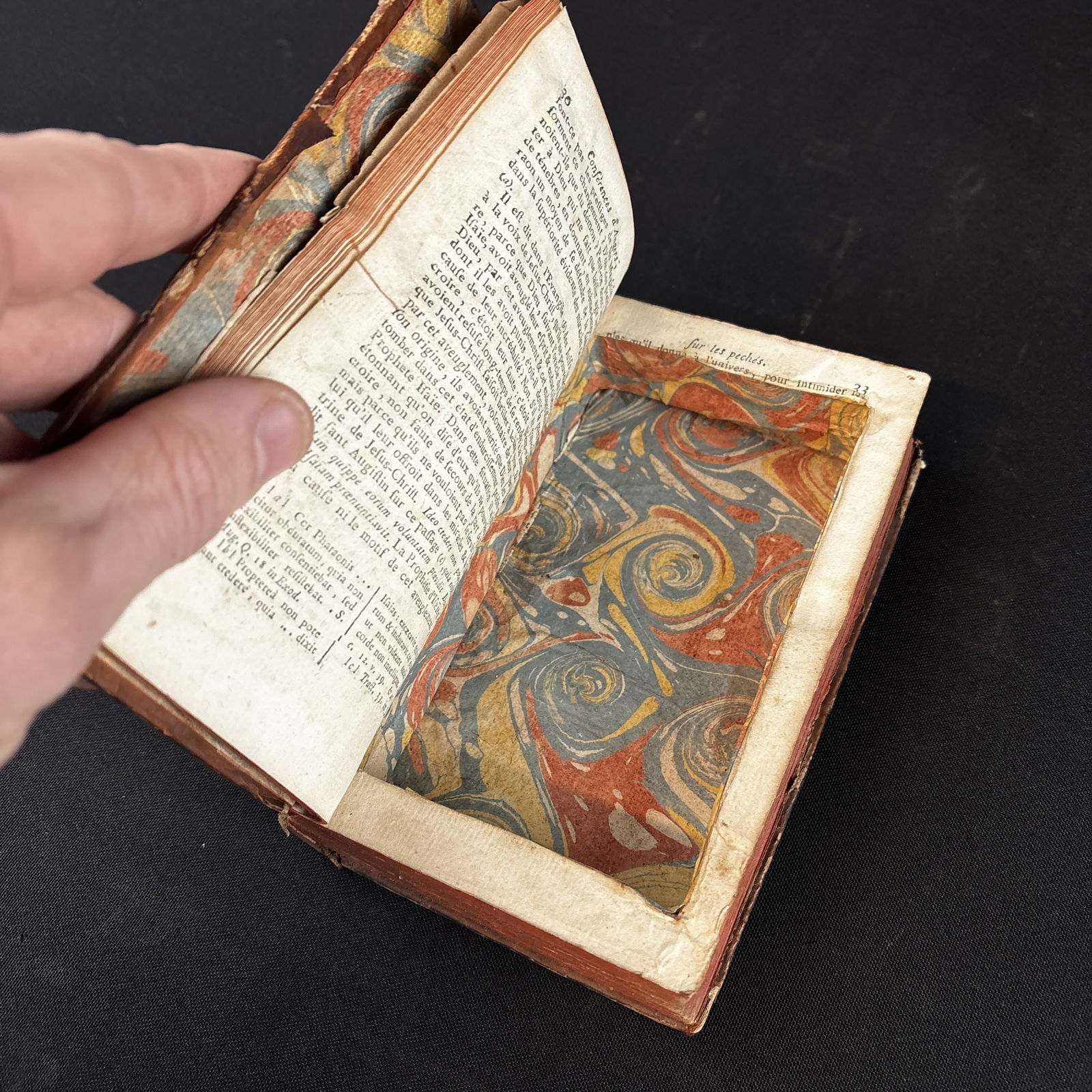 Antique leather Book That Has Been Hollowed Out For a Hiding Place: Antique leather Book hollowed out for a Secret Compartment. The book was published in1760