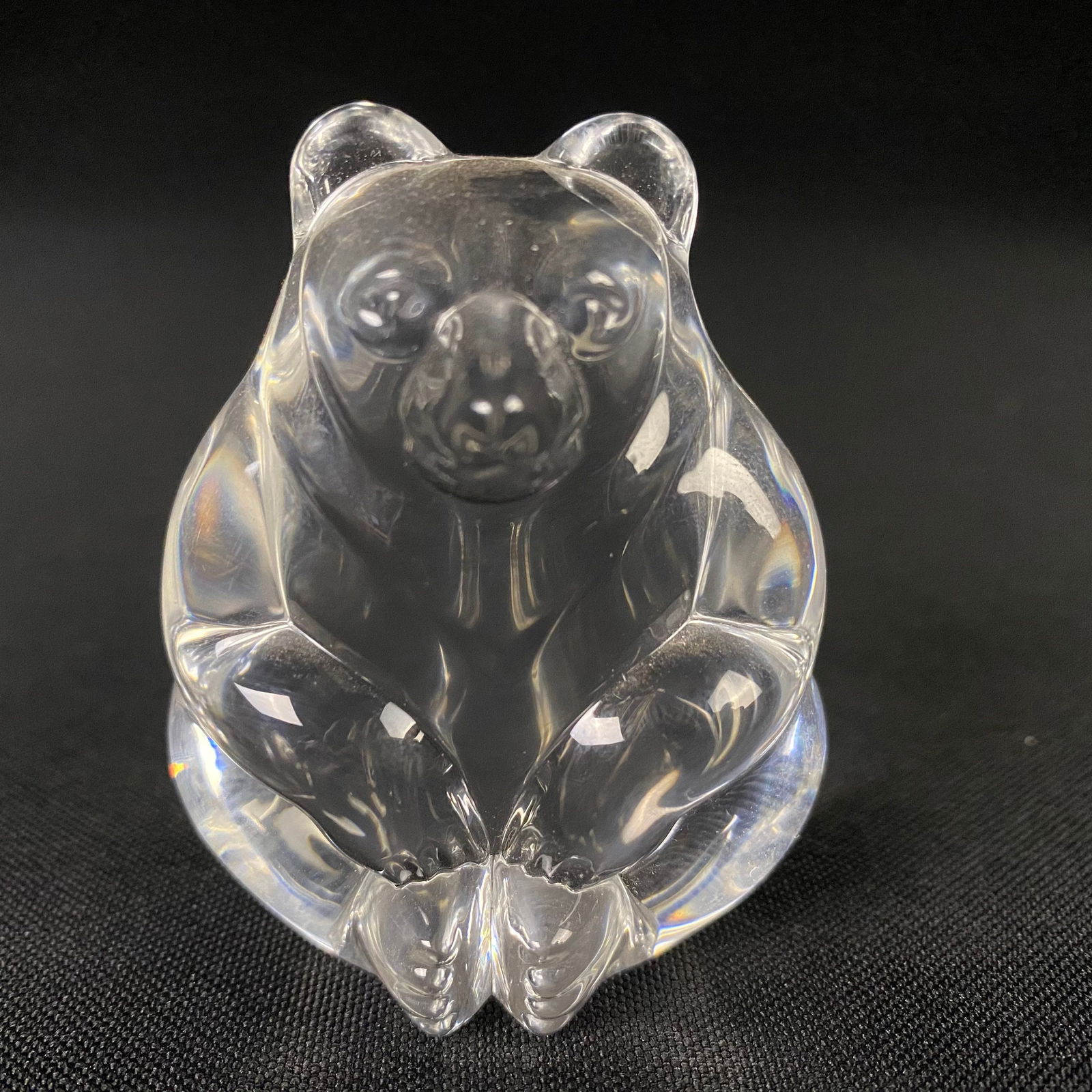 Steuben Glass Lead Crystal Sitting Bear Figurine: Steuben Glass Lead Crystal Sitting Bear Figurine. Condition is excellent, with no chips, cracks, or breaks. Mild surface wear including scratches and mild surface grime. It has a hand etched signature
